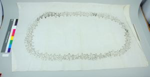 Image of Embroidered tablecloth with figures in a circle (partially completed)